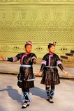 The Dong, a Kam–Sui people of southern China, are one of the 56 ethnic groups officially recognized by the People's Republic of China. They are famed for their native-bred Kam Sweet Rice, carpentry skills, and unique architecture, in particular a form of covered bridge known as the 'wind and rain bridge'. The Dong people live mostly in eastern Guizhou, western Hunan, and northern Guangxi provinces. Small pockets of Dong speakers are also found in Tuyên Quang province, northern Vietnam.<br/><br/>

Nanning was originally founded during the Yuan Dynasty (1271 - 1368), although there was a county seat here called Jinxing as far back as 318 CE.<br/><br/>

Opened to foreign trade by the Chinese in 1907, Nanning grew rapidly. From 1912 to 1936 it was the provincial capital of Guangxi, replacing Guilin.<br/><br/>

Due to its proximity to the Vietnamese  border Nanning became a major centre for supplying Ho Chi Minh's North Vietnam during the Second Indochina War (Vietnam War).